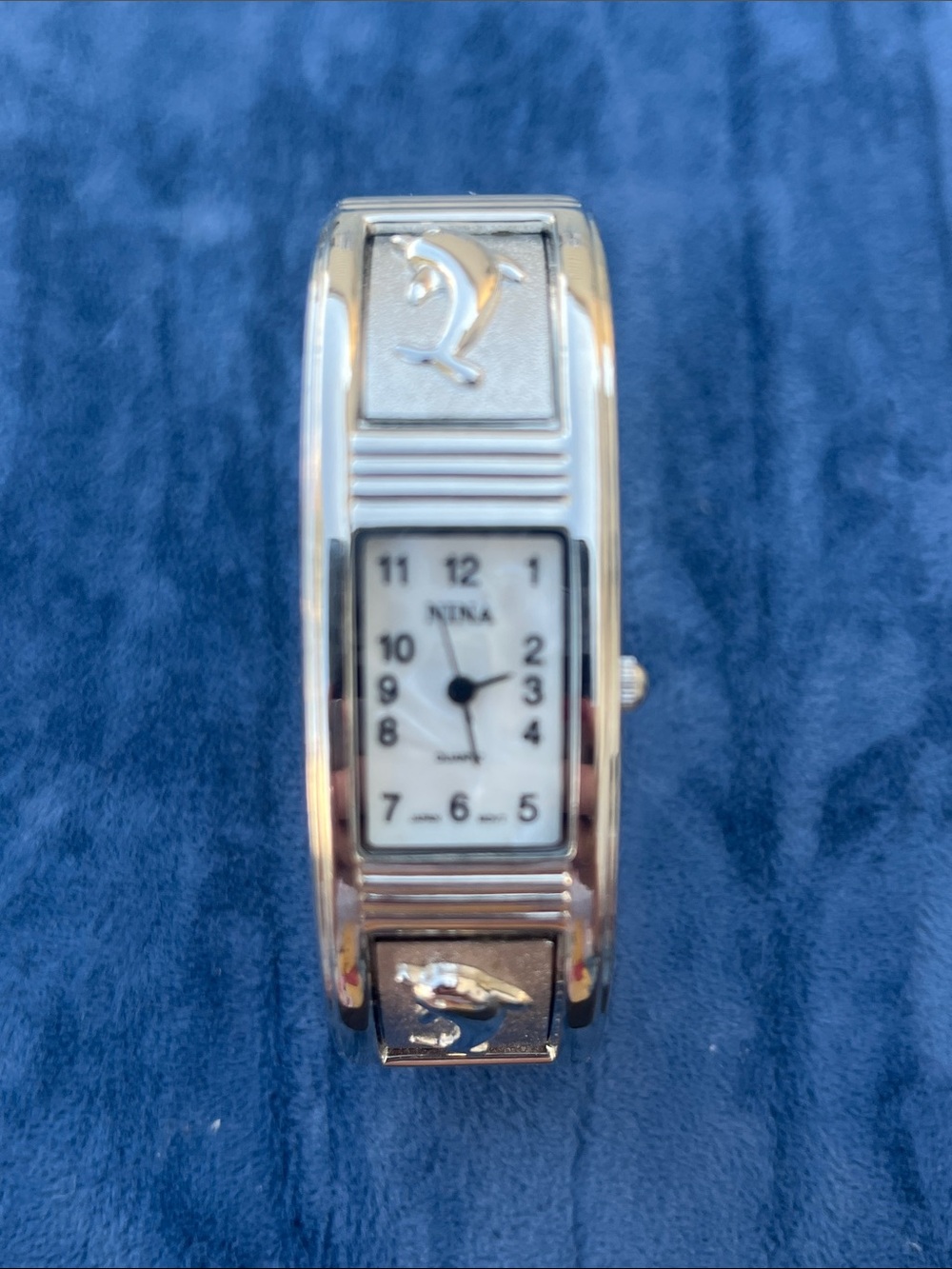 Nina Silver Tone Dolphin Cuff Bangle Bracelet Watch